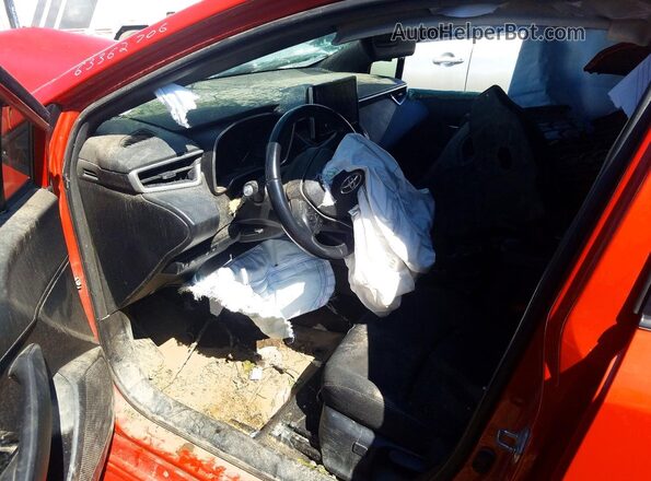 JTNK4MBE5P3199385 2023 TOYOTA COROLLA Orange Front interior view