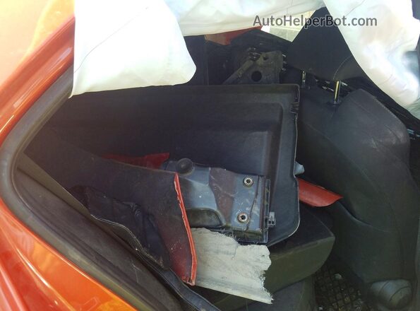 JTNK4MBE5P3199385 2023 TOYOTA COROLLA Orange Rear seats view