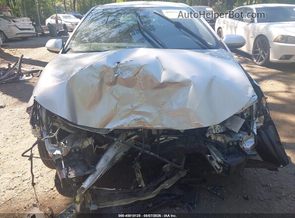 JTNK4RBE0K3039193 2019 TOYOTA COROLLA Серебряный Вид задней части салона