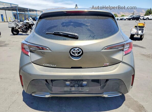 JTNK4RBE3K3061480 2019 TOYOTA COROLLA Green Rear view