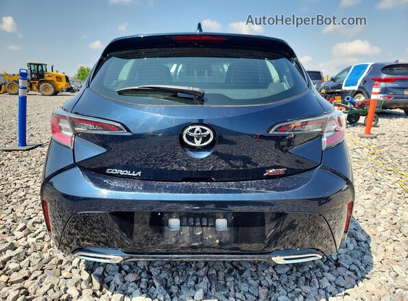 JTNK4RBE7K3068058 2019 TOYOTA COROLLA Blue Widok z tyłu