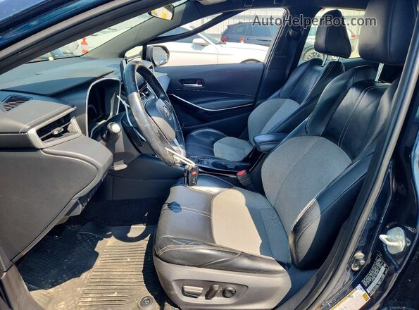JTNK4RBE7K3068058 2019 TOYOTA COROLLA Blue Widok wnętrza z przodu