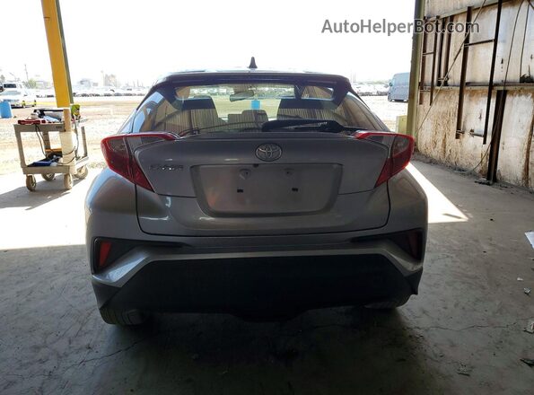 JTNKHMBX7K1033072 2019 TOYOTA C-HR Серебряный Вид сзади