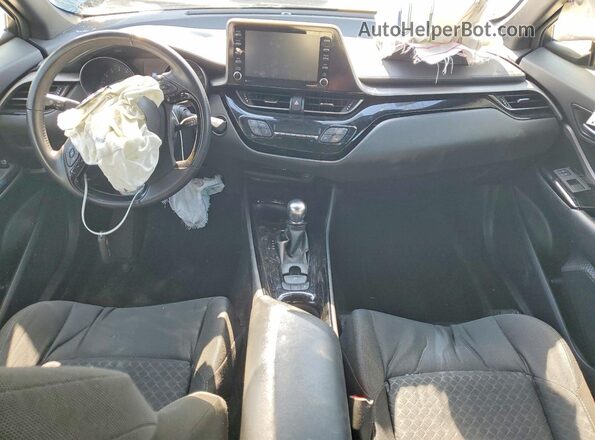 JTNKHMBX8M1125410 2021 TOYOTA C-HR Белый Вид панели приборов