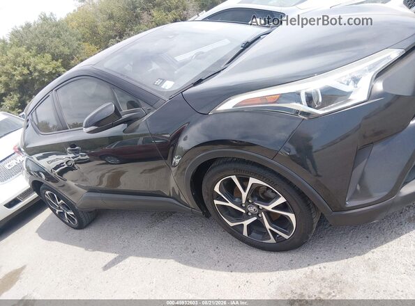 JTNKHMBX9J1007281 2018 TOYOTA C-HR Black უკანა სალონის ხედი