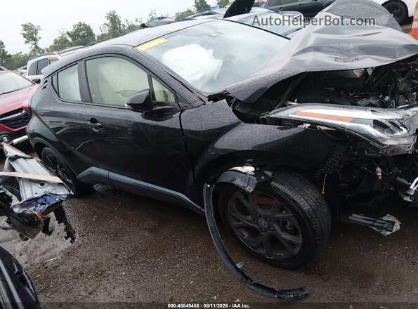 JTNKHMBXXM1112223 2021 TOYOTA C-HR Black Vista interior trasera
