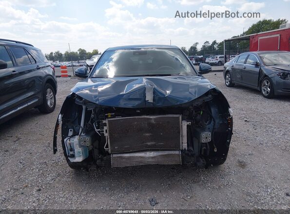 KL47LAE23RB099673 2024 BUICK OTHER Blue Սալոնի հետևի տեսք