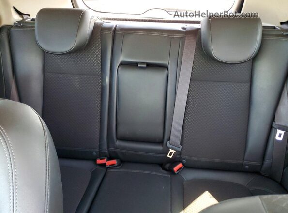 KL4CJ2SBXJB671454 2018 BUICK ENCORE Black Vista de los asientos traseros