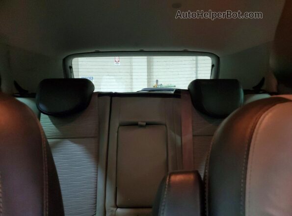 KL4CJASB0GB554338 2016 BUICK ENCORE White Rear seats view
