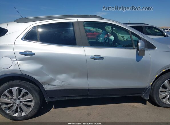 KL4CJASB0KB725579 2019 BUICK ENCORE Серебряный Вид задней части салона