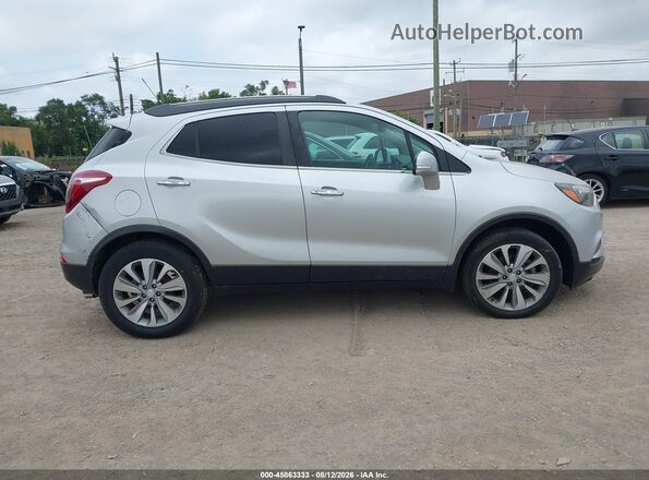 KL4CJASB6JB575993 2018 BUICK ENCORE Серебряный Вид задней части салона