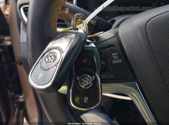 KL4CJASB9JB574854 2018 BUICK ENCORE Gold Dashboard view