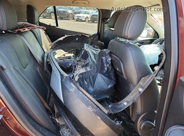KL4MMBS21PB099887 2023 BUICK ENCORE Maroon Rear interior view