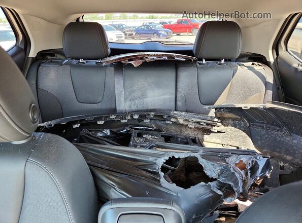KL4MMBS21PB099887 2023 BUICK ENCORE Maroon Rear seats view