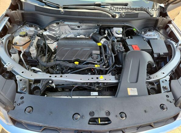 KL77LFE22RC232627 2024 CHEVROLET TRAX Silver Rear interior view