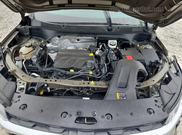 KL77LFE24RC021011 2024 CHEVROLET TRAX Green Вид задньої частини салону