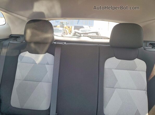 KL77LFE27RC097774 2024 CHEVROLET TRAX Blue Rear seats view