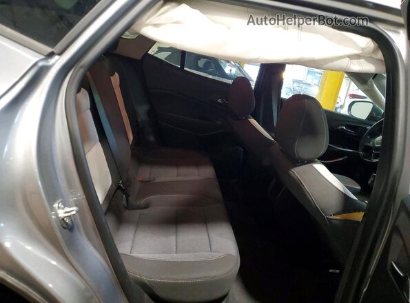 KL77LFE28RC088016 2024 CHEVROLET TRAX Серый Вид задней части салона