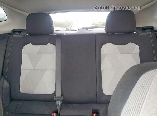 KL77LFEP6SC184048 2025 CHEVROLET TRAX White Vista de los asientos traseros