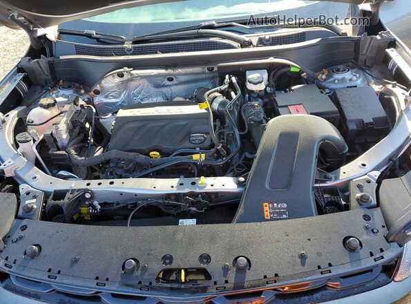 KL77LGE23RC131456 2024 CHEVROLET TRAX Серебряный Вид подкапотного пространства