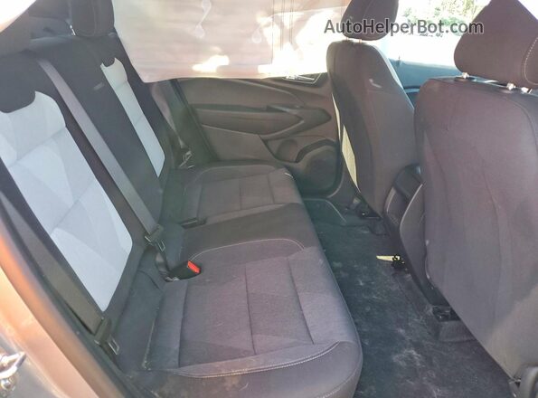 KL77LGE23RC131456 2024 CHEVROLET TRAX Серебряный Вид задней части салона