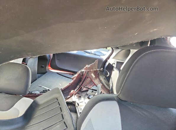KL77LGE24RC112592 2024 CHEVROLET TRAX Red Vista de los asientos traseros