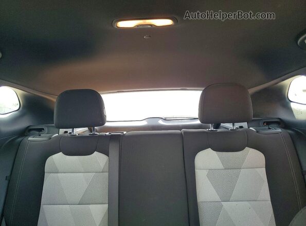 KL77LGE27RC228434 2024 CHEVROLET TRAX Yellow Vista de los asientos traseros