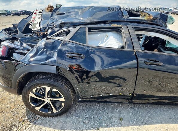 KL77LGEP6TC112001 2026 CHEVROLET TRAX Black Vista de los asientos traseros