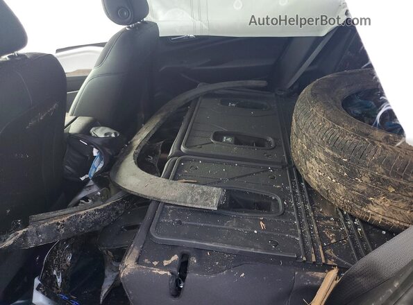 KL77LHE22TC029014 2026 CHEVROLET TRAX Black Widok wnętrza z tyłu