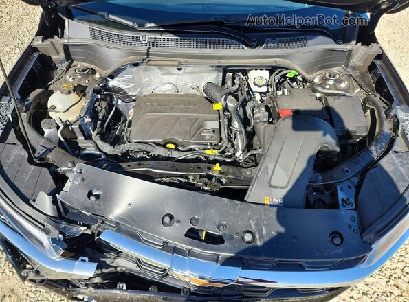 KL77LHEP2TC080797 2026 CHEVROLET TRAX Black Vista del compartimento del motor