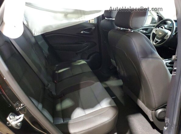 KL77LHEP2TC081142 2026 CHEVROLET TRAX Black Vista interior trasera