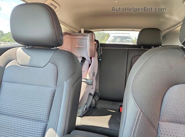 KL77LHEP4SC308295 2025 CHEVROLET TRAX Blue Rear seats view