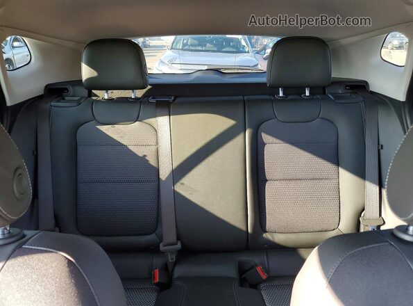 KL77LHEP6TC065672 2026 CHEVROLET TRAX Red Vista de los asientos traseros