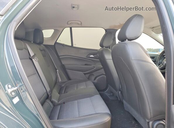 KL77LHEP8SC052422 2025 CHEVROLET TRAX Green Rear interior view