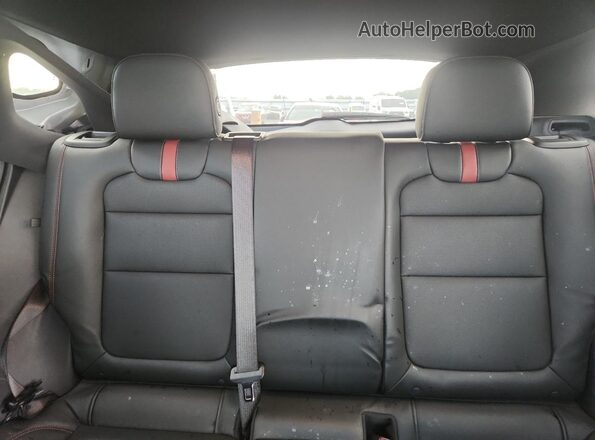 KL77LJEP6SC103276 2025 CHEVROLET TRAX White Vista de los asientos traseros