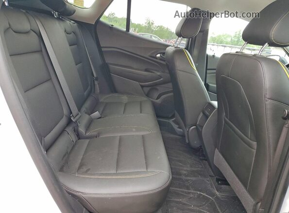 KL77LKE27RC223690 2024 CHEVROLET TRAX Белый Вид задней части салона