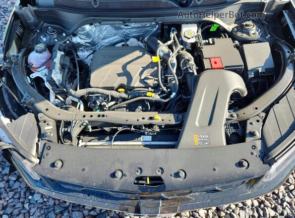 KL77LKEP8TC100158 2026 CHEVROLET TRAX Черный Вид задней части салона