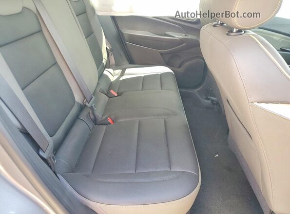 KL77LKEP9TC029519 2026 CHEVROLET TRAX Silver Rear interior view