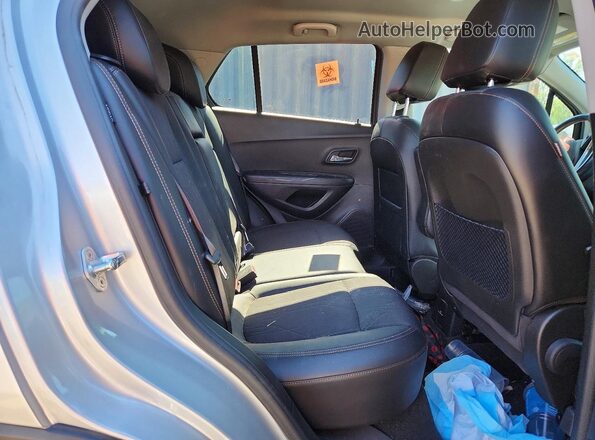 KL7CJPSB3KB813922 2019 CHEVROLET TRAX Серебряный Вид задней части салона