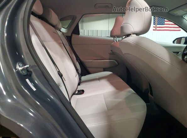 KM8HBCAB2RU040421 2024 HYUNDAI KONA Gray Vista interior trasera