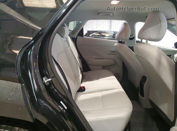 KM8HBCAB3RU132296 2024 HYUNDAI KONA Black Rear interior view