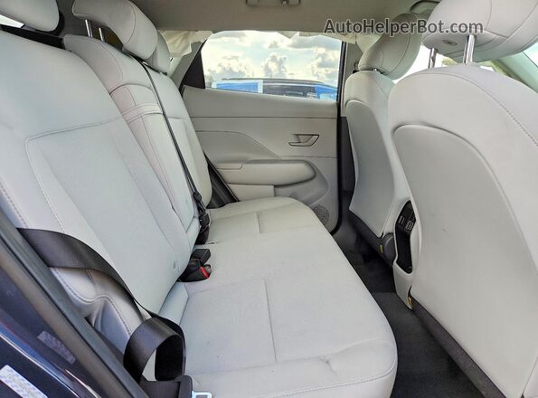KM8HBCAB3RU179151 2024 HYUNDAI KONA Blue Vista interior trasera