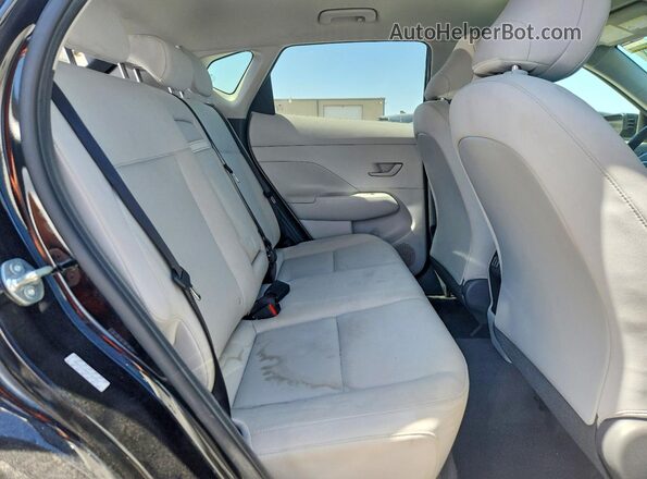 KM8HBCAB4RU159409 2024 HYUNDAI KONA Black Вид задньої частини салону
