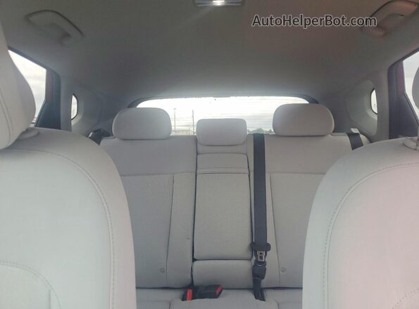 KM8HCCAB2SU297419 2025 HYUNDAI KONA Red Rear seats view