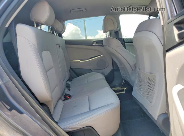 KM8J23A43JU752265 2018 HYUNDAI TUCSON Gray Widok wnętrza z tyłu