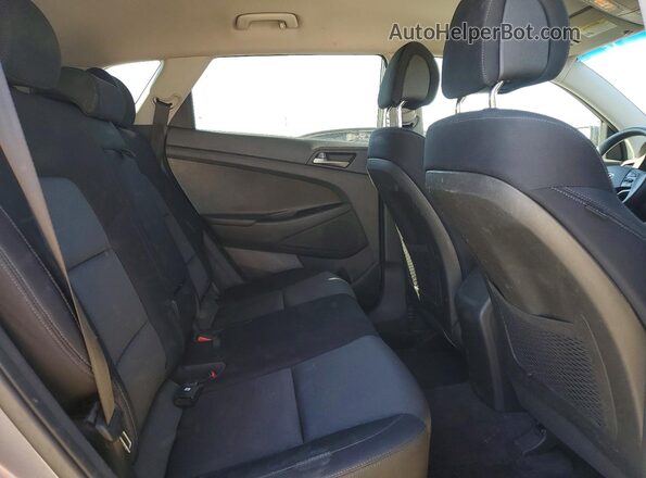 KM8J23A46GU209890 2016 HYUNDAI TUCSON Gray Rear interior view