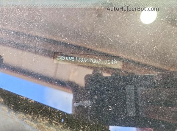 KM8J23A47GU210949 2016 HYUNDAI TUCSON Silver VIN կոդի պիտակի տեսք
