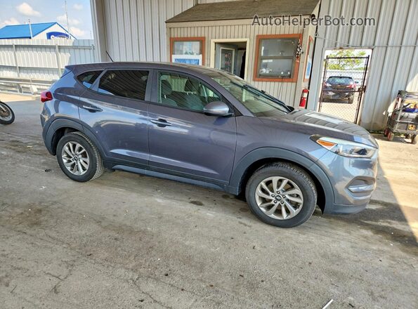 KM8J23A49JU786114 2018 HYUNDAI TUCSON Gray Delantero derecho