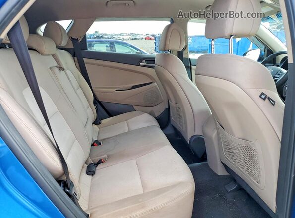KM8J23A4XJU785375 2018 HYUNDAI TUCSON Blue Rear interior view