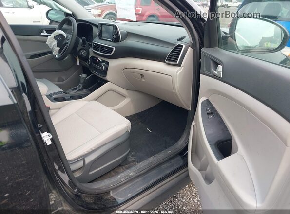 KM8J2CA42KU072889 2019 HYUNDAI TUCSON Черный Вид салона спереди